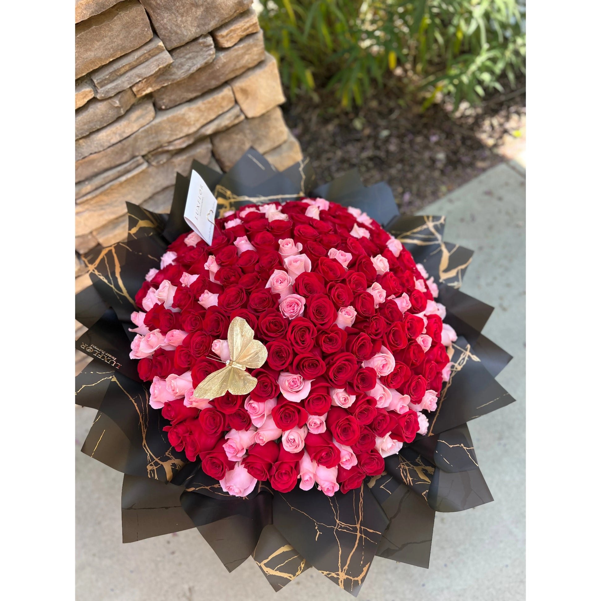 Paper Wrapped Roses - Le Bouquet Fleurs